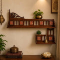 Teak Wood Wall Shelf Adorned with Traditional Dhokra and Warli Art.